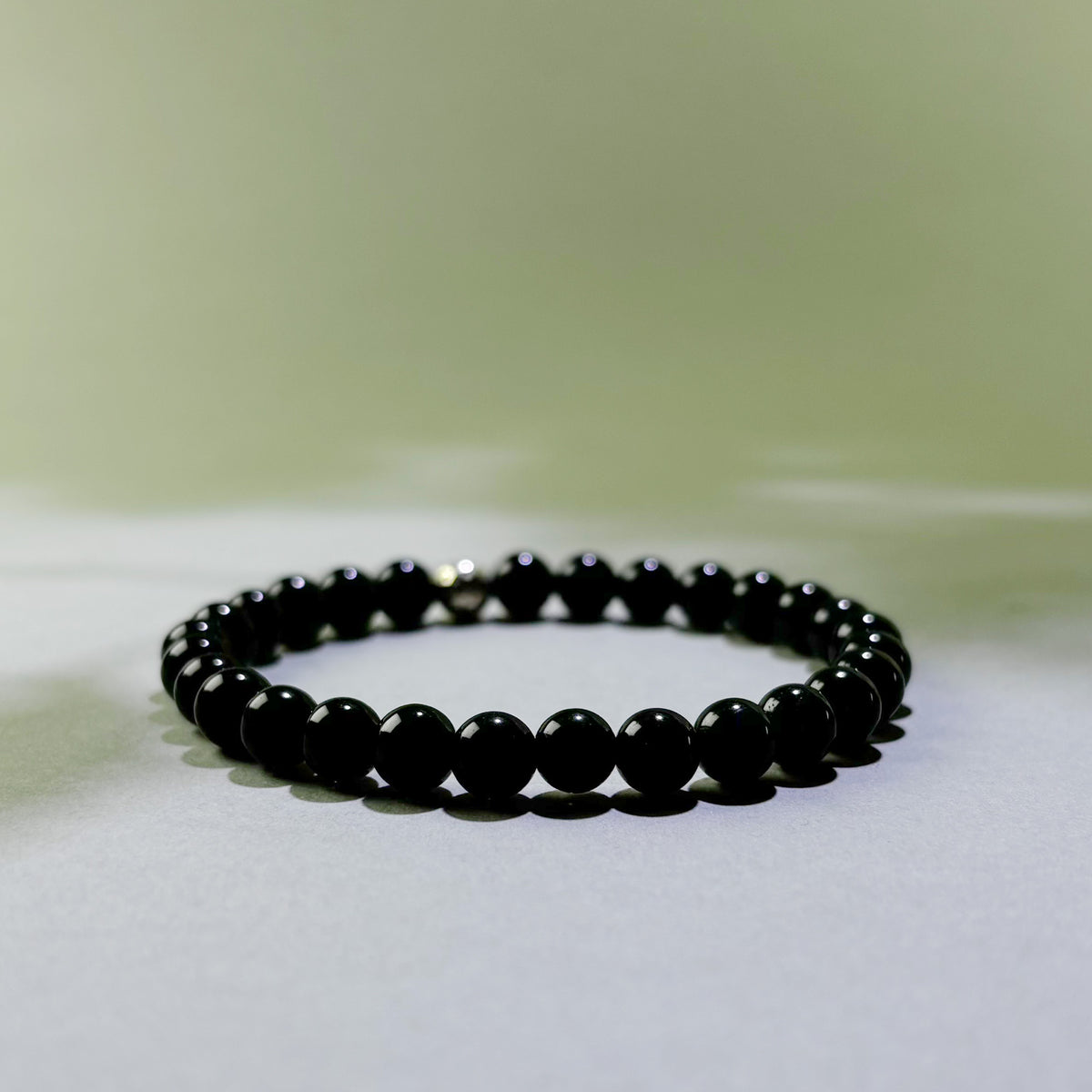 Black Tourmaline and Obsidian crystal bracelet for energy protection and releasing stress after difficult environments