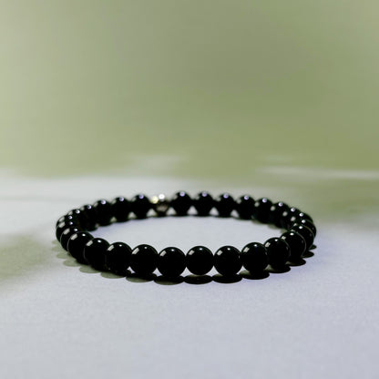 Black Tourmaline and Obsidian crystal bracelet for energy protection and releasing stress after difficult environments
