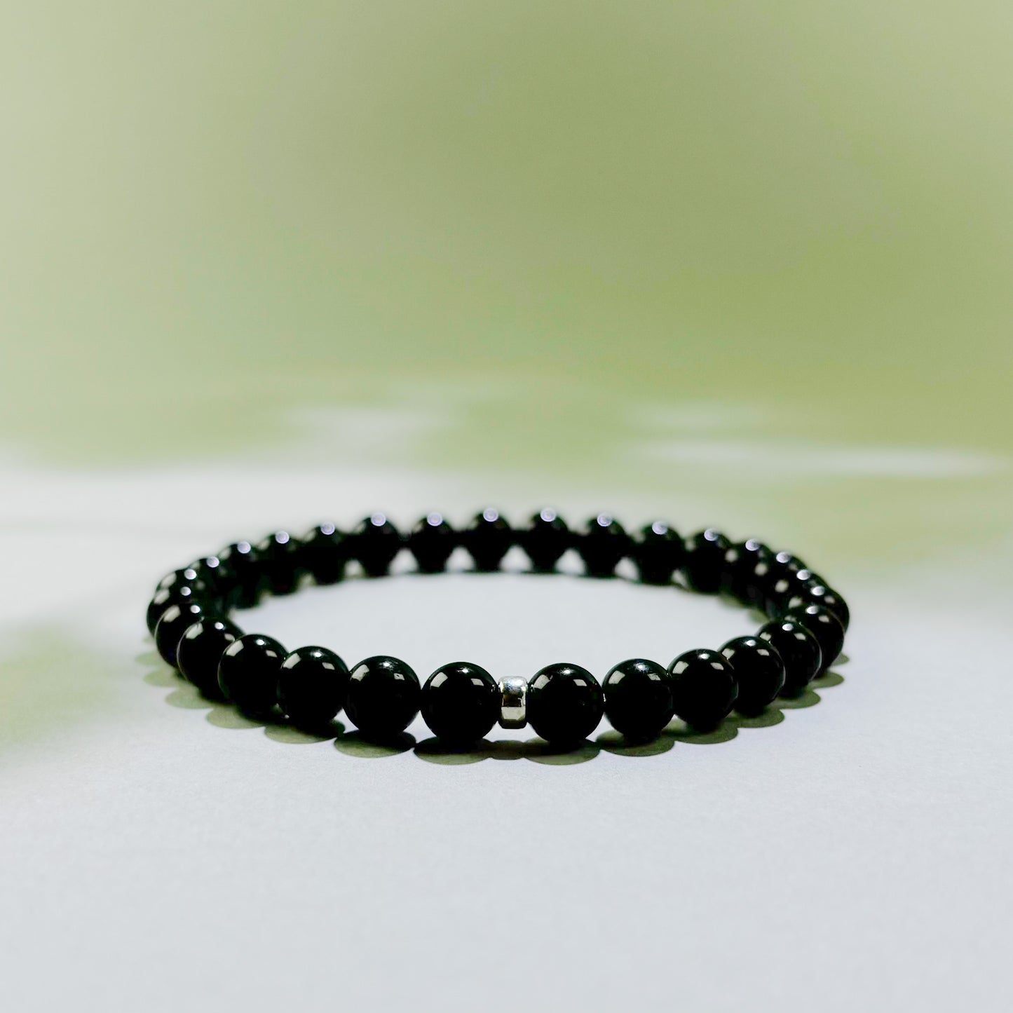 Black Tourmaline crystal bracelet for daily protection, grounding, and reduced emotional absorption