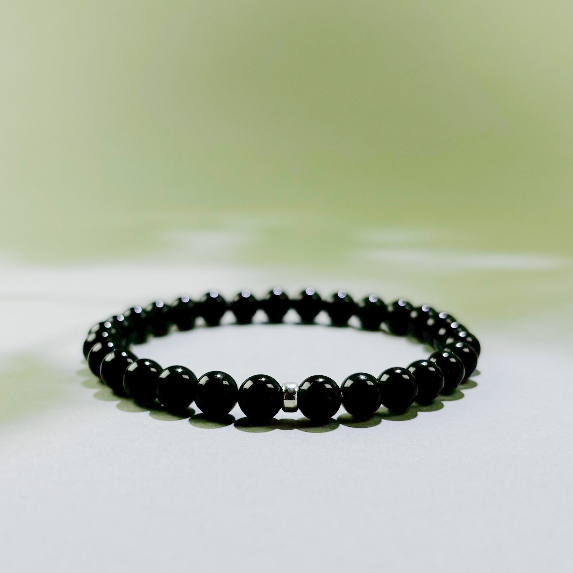 Black Tourmaline crystal bracelet for daily protection, grounding, and reduced emotional absorption