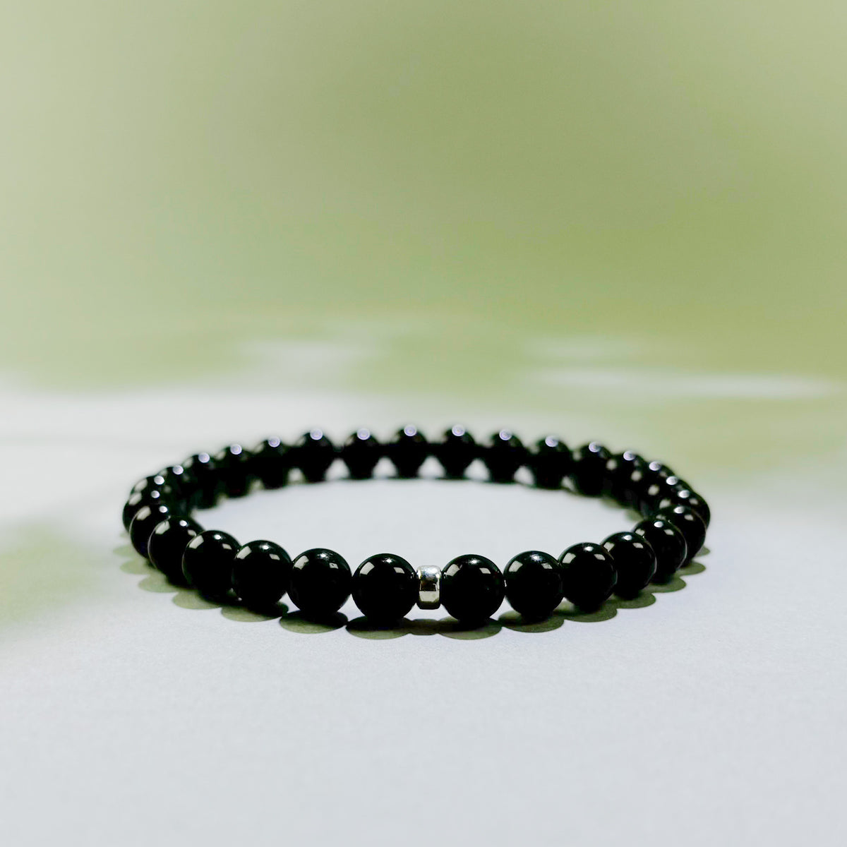 Black Tourmaline crystal bracelet for daily protection, grounding, and reduced emotional absorption
