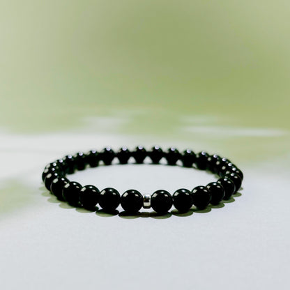 Black Tourmaline crystal bracelet for daily protection, grounding, and reduced emotional absorption