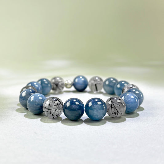 Blue Kyanite and Black Rutilated Quartz crystal bracelet for speaking up and holding your position under pressure