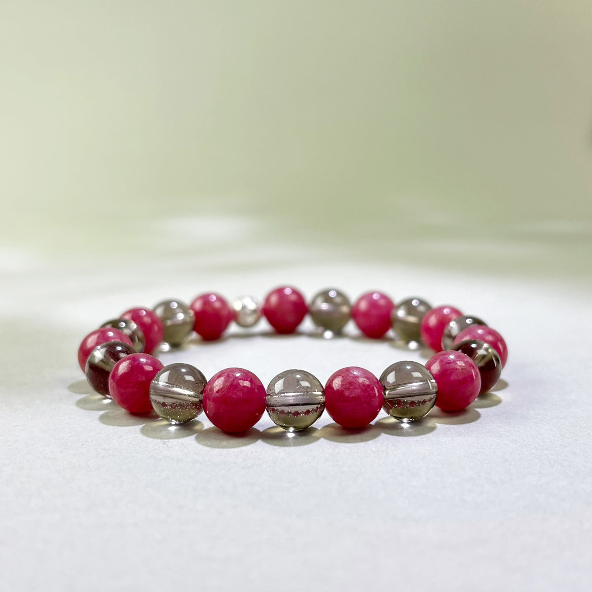 Rhodonite and Smoky Quartz crystal bracelet for lingering hurt, resentment, and difficulty forgiving