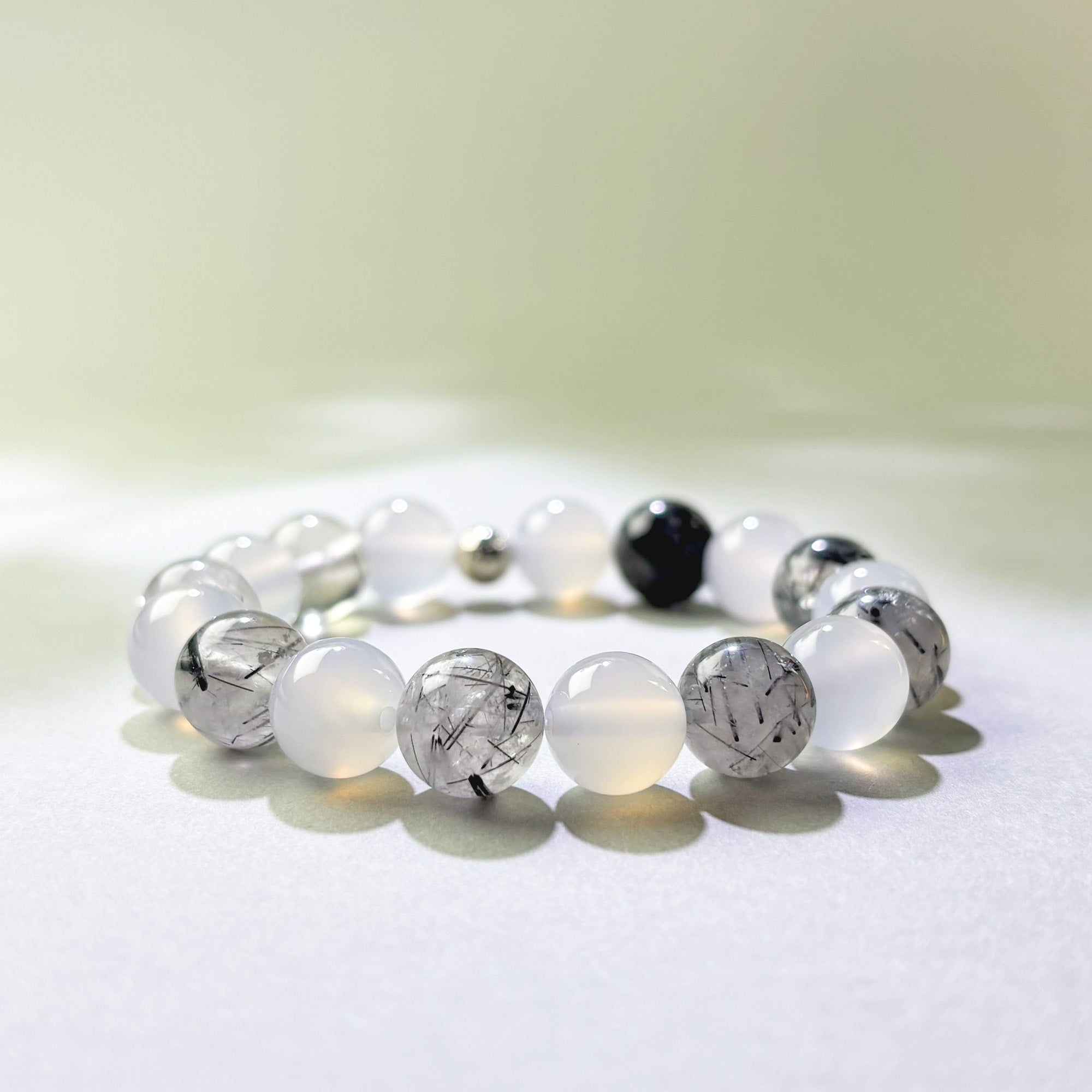 White Agate and Black Rutilated Quartz crystal bracelet for replaying conversations after they end