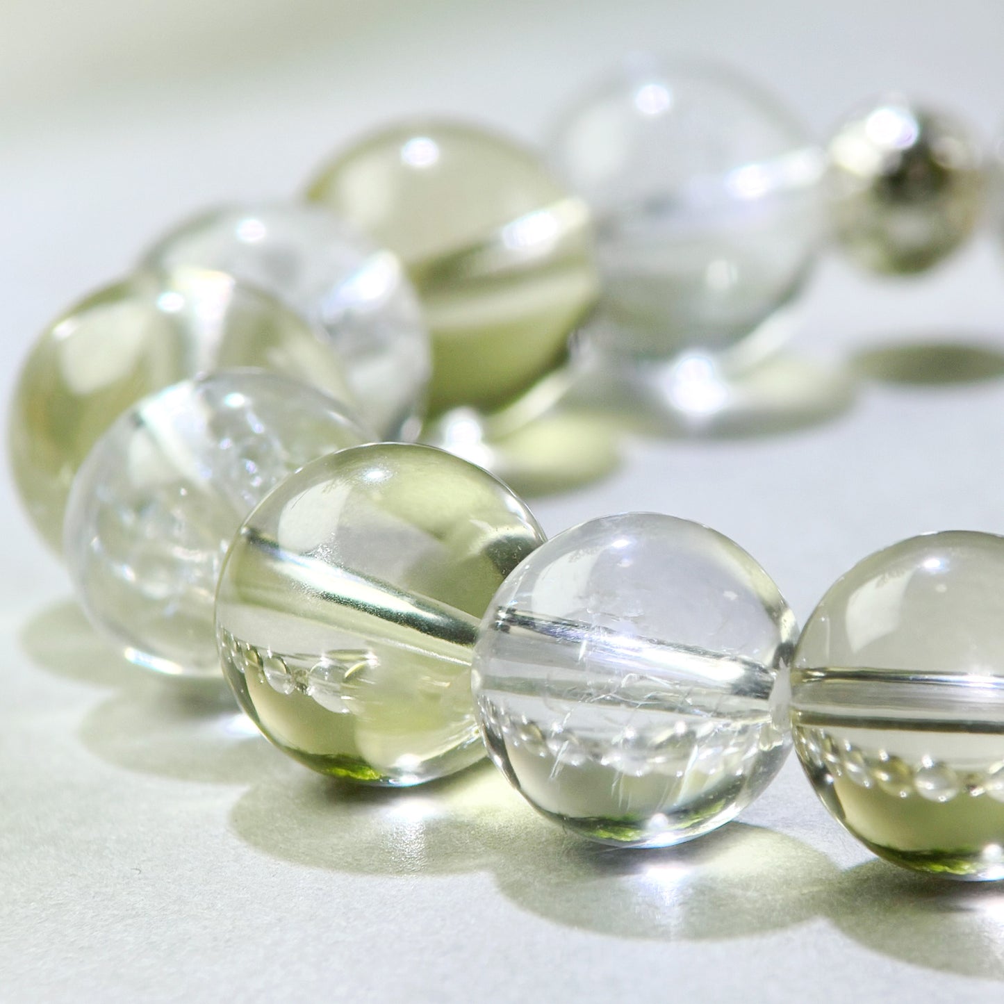 Close-up of Citrine and Himalayan Clear Quartz beads in a crystal bracelet for clearer access to thoughts