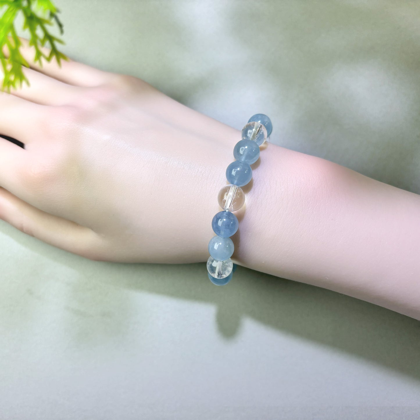 Aquamarine and Himalayan Clear Quartz bracelet worn on wrist for conversations that are easier for others to follow