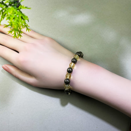 Citrine and Pyrite bracelet worn on wrist for greater confidence in pricing, pay, and negotiation