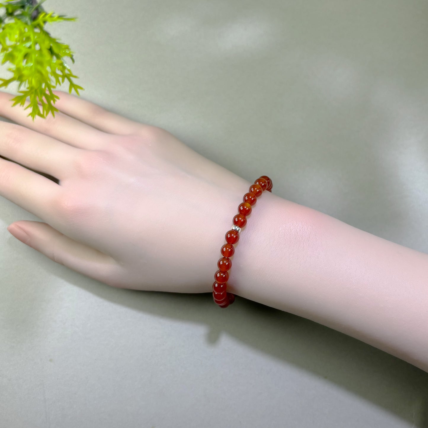 Carnelian bracelet worn on wrist for greater initiative and easier action when motivation feels low