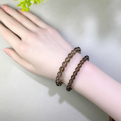 Smoky Quartz bracelet worn on wrist for staying grounded and protected in busy or stressful environments
