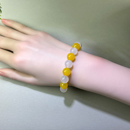 Yellow Agate and White Agate bracelet worn on wrist for helping thoughts settle naturally at night