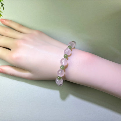 Rose Quartz and Green Hetian Jade bracelet worn on wrist for feeling more secure in relationships