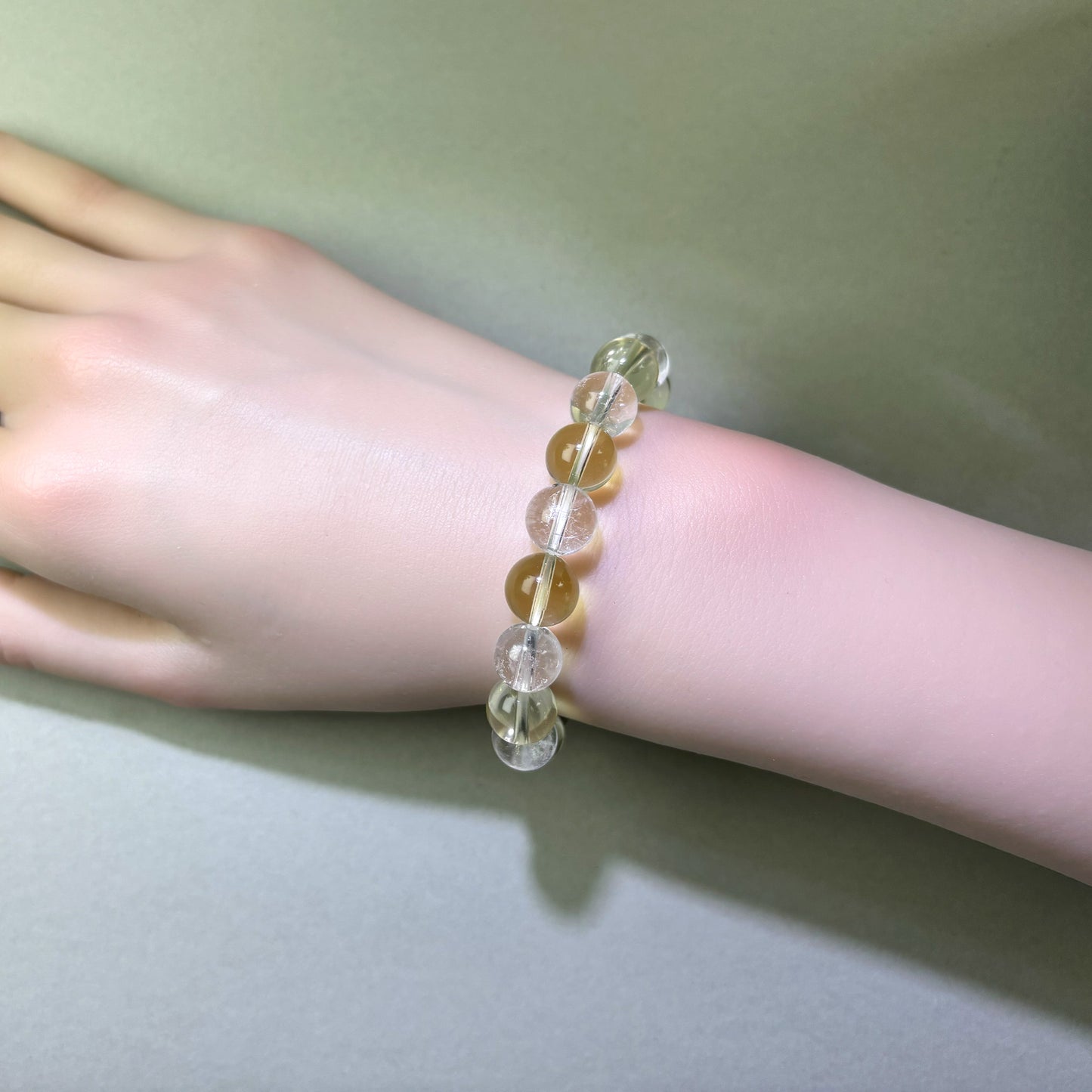 Citrine and Himalayan Clear Quartz bracelet worn on wrist for steadier expression under pressure