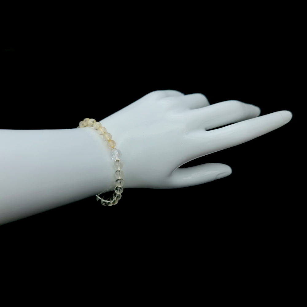 Rooted Abundance bracelet worn on wrist ¨C handcrafted Feng Shui jewelry for Career & Abundance.